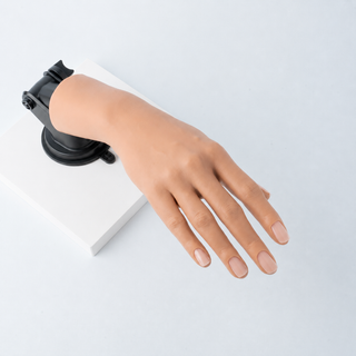 Mannequin hand with a suction for nail practice 