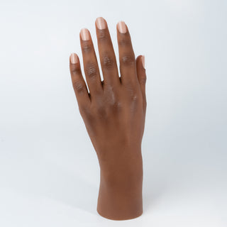 Detailed silicone practice hand for nail art, realistic texture and skin tone